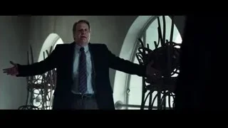 man in suit in room with arched window — Steve Jobs