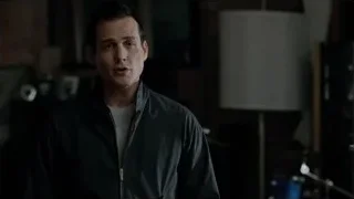 Man in dimly lit room — Suits