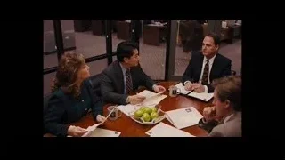 man talking on phone in office — The Wolf Of Wall Street