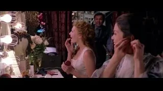two women in dressing room with mirror — Spider Man 2