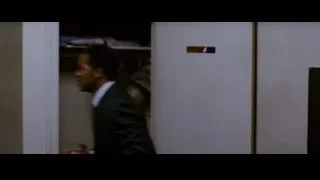 Man in suit talking on phone — The Persuit of Happyness