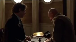 man holding microphone by fireplace — Breaking Bad