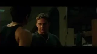 Two men facing each other in dimly lit room — Bruce Lee: Birth of The Dragon