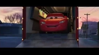 Red car parked in garage at sunset — Cars 3