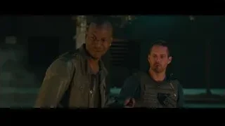 two men standing in dimly lit street — Furious Seven