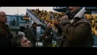 man in Bane mask at stadium — Batman: The Dark Knight Rises