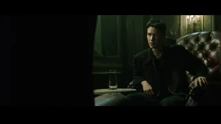 man sitting in brown leather armchair — The Matrix
