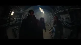man in red cloak walking with women in tunnel — Doctor Strange 2