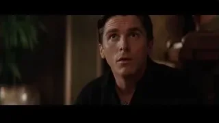 Man sitting in dimly lit room — Batman