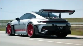 silver Porsche 911 GT3 RS on race track — Sports Cars