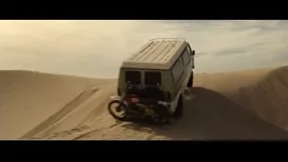 jeep driving on sand dunes — F1