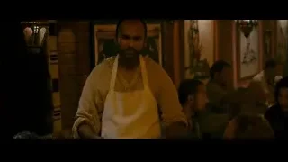 man holding food plate in restaurant — The Dictator