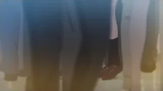 Group of people standing in line — Your Name