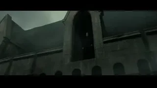 man in doorway of old stone building — Harry Potter and the Deathly Hallows 2