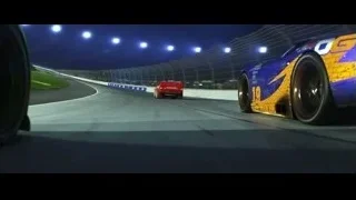 race cars on track at night — Cars 3