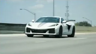white Corvette Stingray driving on highway — Sports Cars