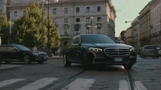 Black Mercedes on European street — Succession