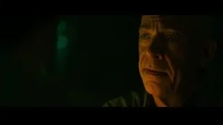 Elderly man's face in dark room — Whiplash
