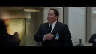two men in suits walking in hallway — Iron Man 3