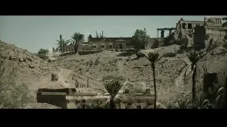 Old dilapidated building on desert hillside — Gladiator 2