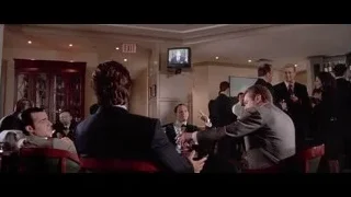 men in suits in a bar — American Psycho