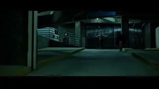 man holding gun with distressed woman in dark garage — Fight Club