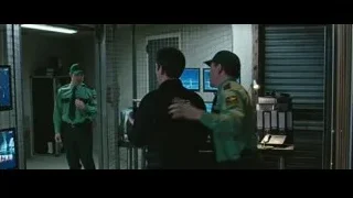 man in uniform in control room with monitors — Now You See Me 2