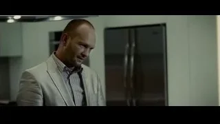 man in kitchen looking at hands — Limitless