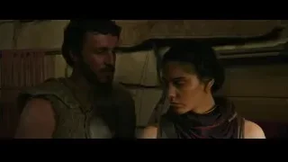 Man in armor and woman in dark room — Gladiator 2