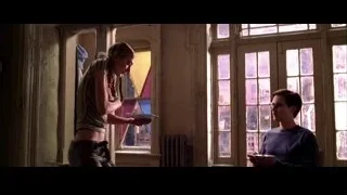woman handing plate to man in dilapidated room — Spider Man 2