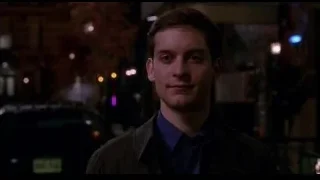 Young man on dimly lit city street at night — Spider Man
