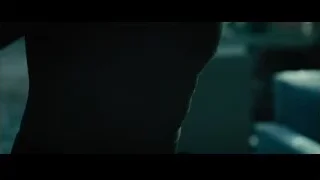 two men confronting in dimly lit room — Furious Seven