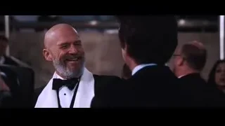 Bald man in tuxedo smiling at event — Iron Man