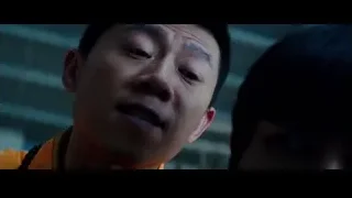 Man in yellow shirt with red forehead mark — Bruce Lee: Birth of The Dragon
