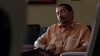 man sitting at office desk with computer — Breaking Bad