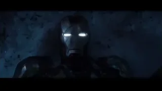 robot with glowing blue eyes in dark room — Iron Man 3