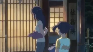young girl by wooden door — Your Name