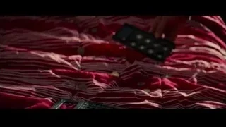 hands holding remote control — The Amazing Spider Man 2