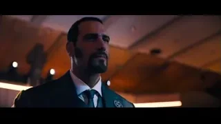 man in suit in dimly lit room — John Wick: Chapter 4