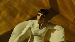 woman in white dress with sunglasses — Blade Runner 2049
