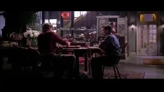 people dining in dimly lit restaurant — Spider Man 2