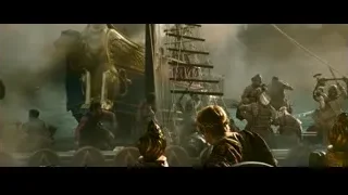 People battling on ship with lion statue — Gladiator 2