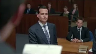 Man in suit speaking in courtroom — Suits
