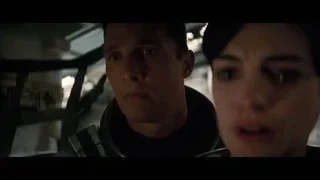 man and woman's faces in dark room — Interstellar