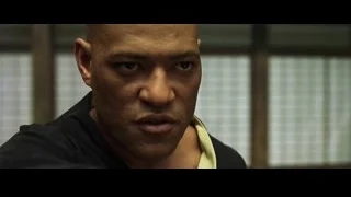 bald man with serious expression — The Matrix