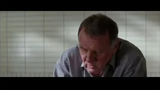 older man with serious expression — Batman