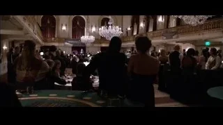 People in formal event space with poker tables — Southpaw