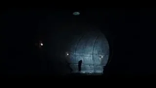 person walking through dark concrete tunnel — The Amazing Spider Man