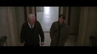 two men walking in hallway — Batman