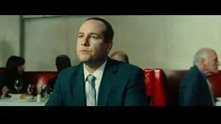 man in suit deep in thought at restaurant — Limitless
